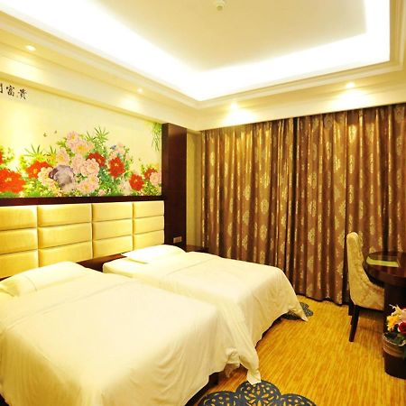 New West Street Hotel - Grand Wing Yangshuo Quarto foto