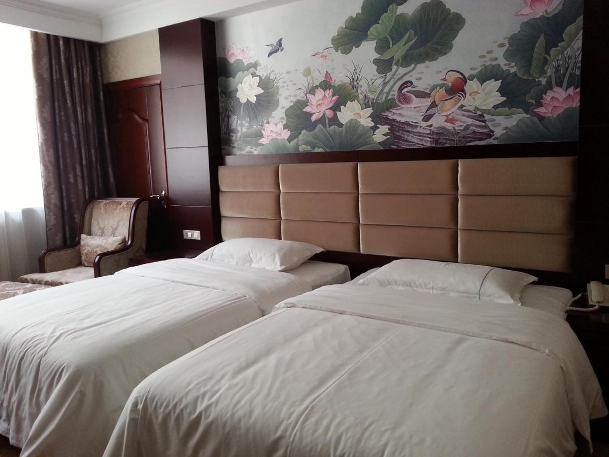 New West Street Hotel - Grand Wing Yangshuo Quarto foto