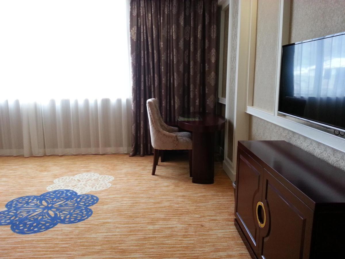 New West Street Hotel - Grand Wing Yangshuo Quarto foto